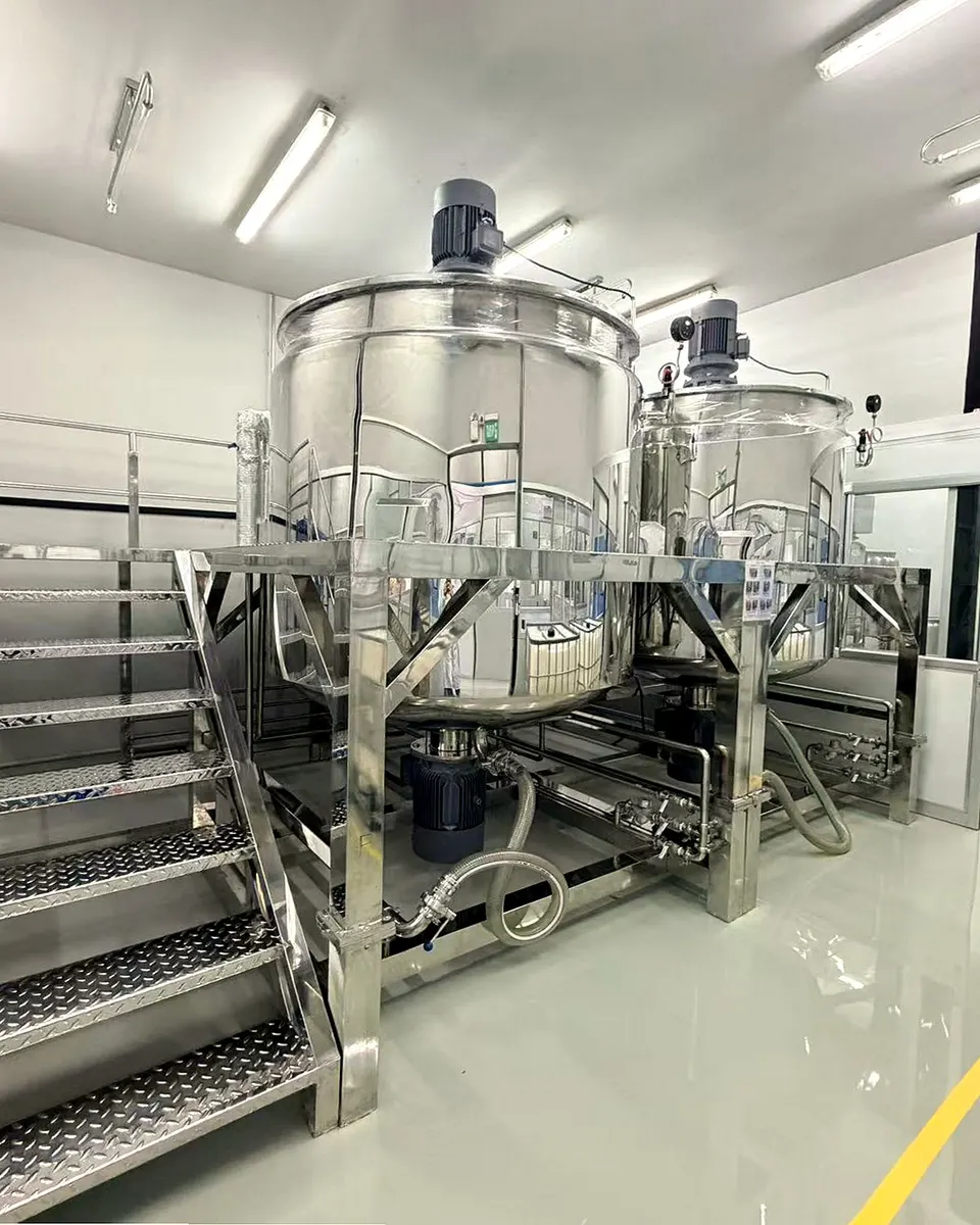 Stainless-steel mixing and compounding tanks inside Sawatdee Group’s cosmetics manufacturing facility in Samut Prakan, Thailand.